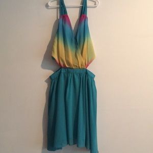 Fun, turquoise bottom multi top, open sides dress.